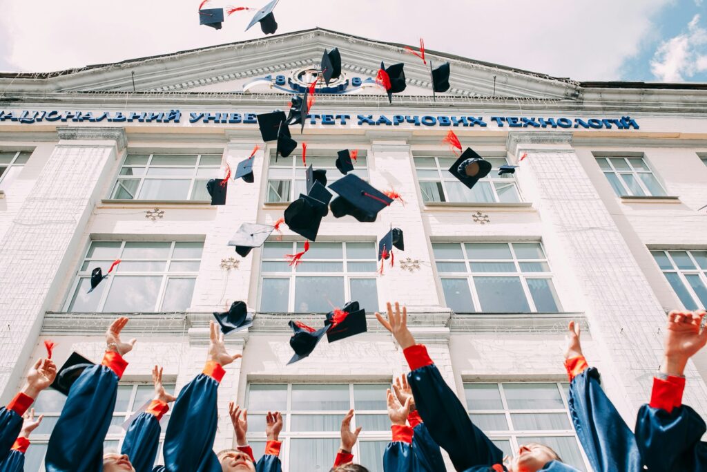 Fresh Graduates Throwing Hats