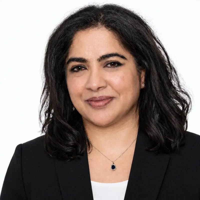 Cindy Muthukarapan, Chief Learning Officer at Coacharya, in a black blazer against a white background