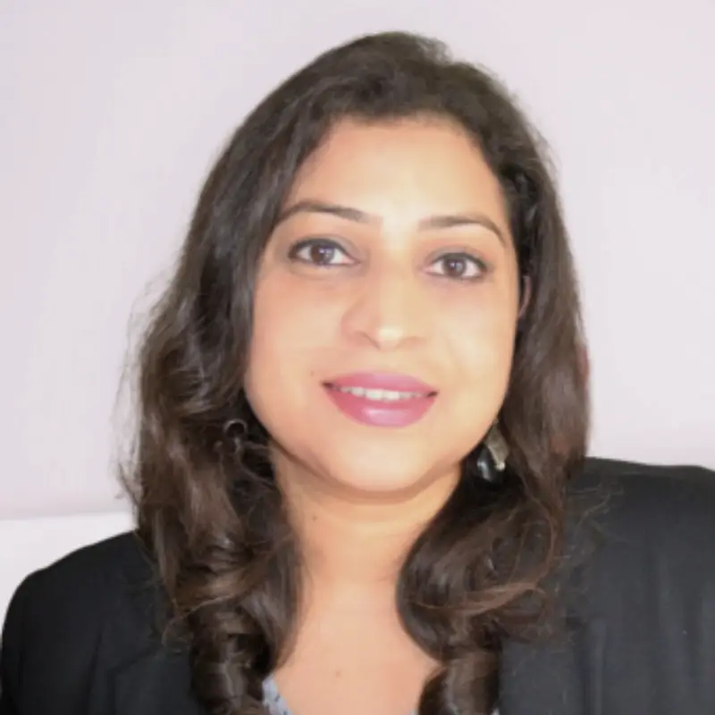 Priya Ramanarayan, Mentor Coach and Content Lead at Coacharya Foundation, in a black blazer
